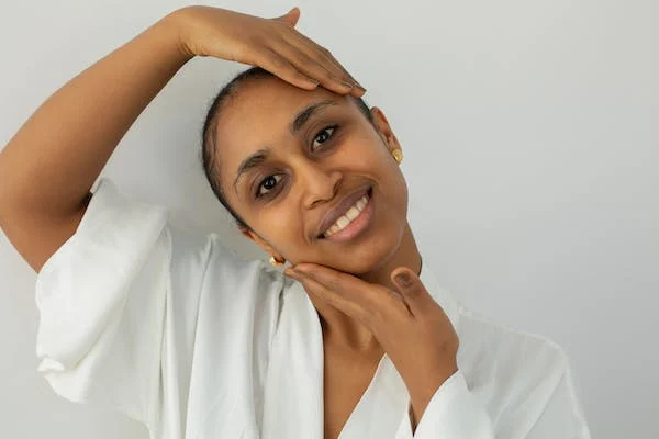 Dr. Karishma Singh, Founder & Medical Director of The Skin Firm, provides expert skin care advice for Indian skin. Close-up of healthy Indian skin, showcasing natural beauty and radiance."